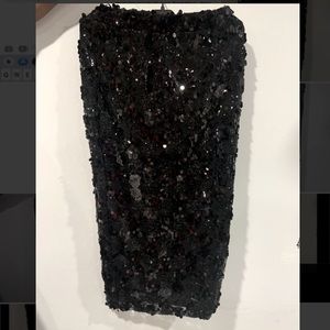 Boohoo black midi sequin skirt with elastic waist.